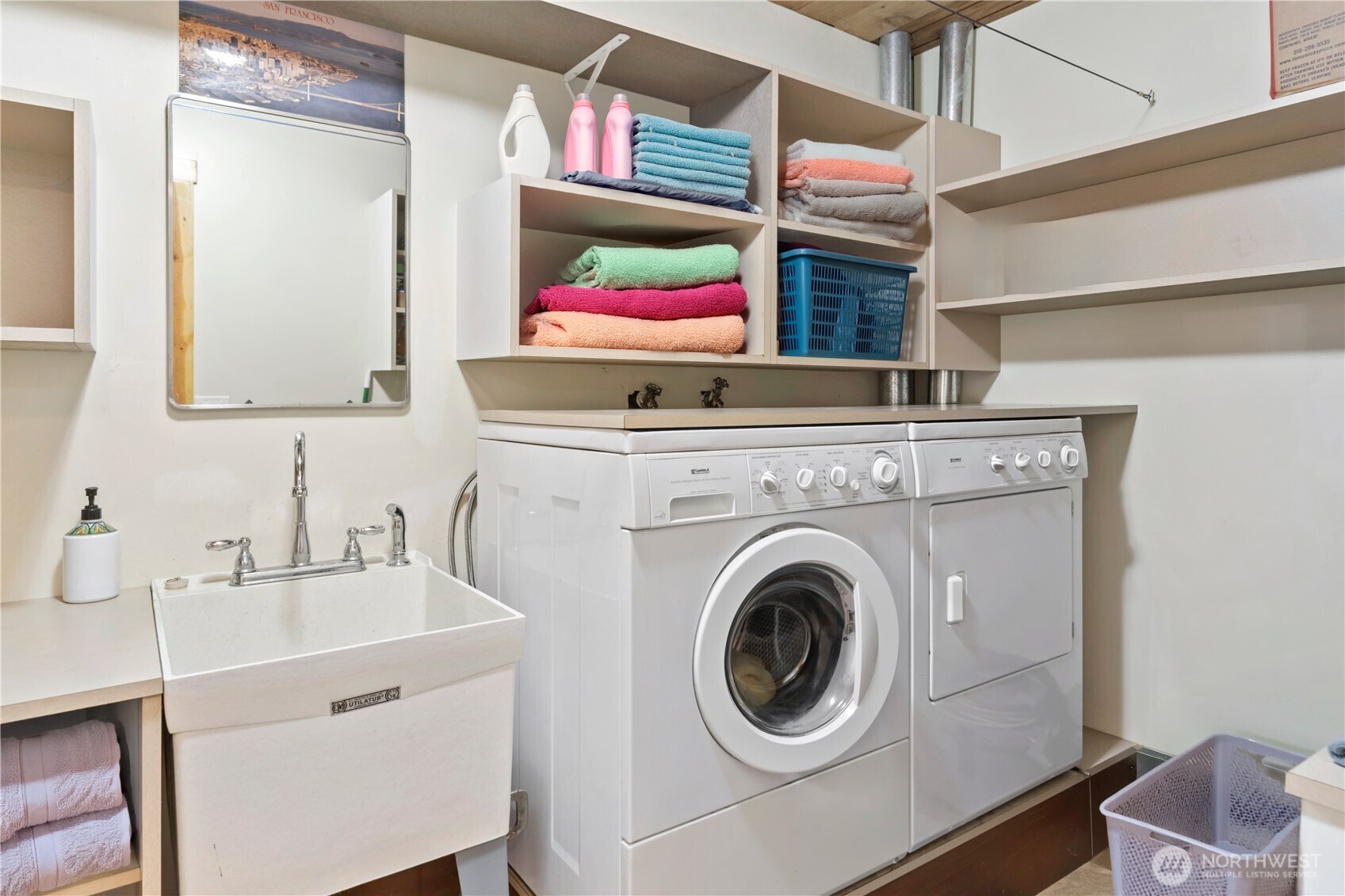 2035 Egg And I Road Chimacum, WA 98325 - Photo 20 of 40 a view of a kitchen sink cabinets and washer dryer