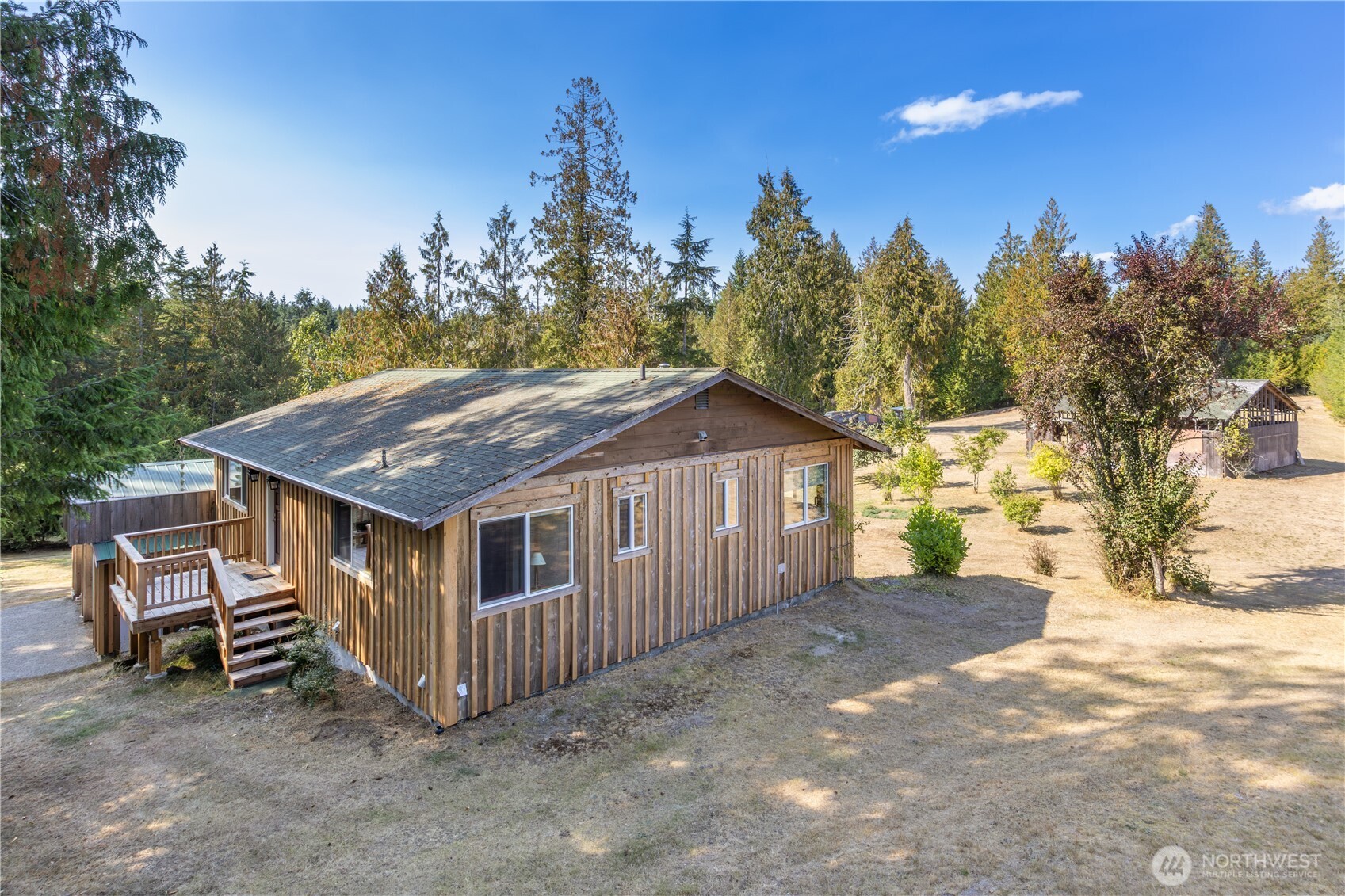 2035 Egg And I Road Chimacum, WA 98325 - Photo 27 of 40 a view of a house with a wooden fence