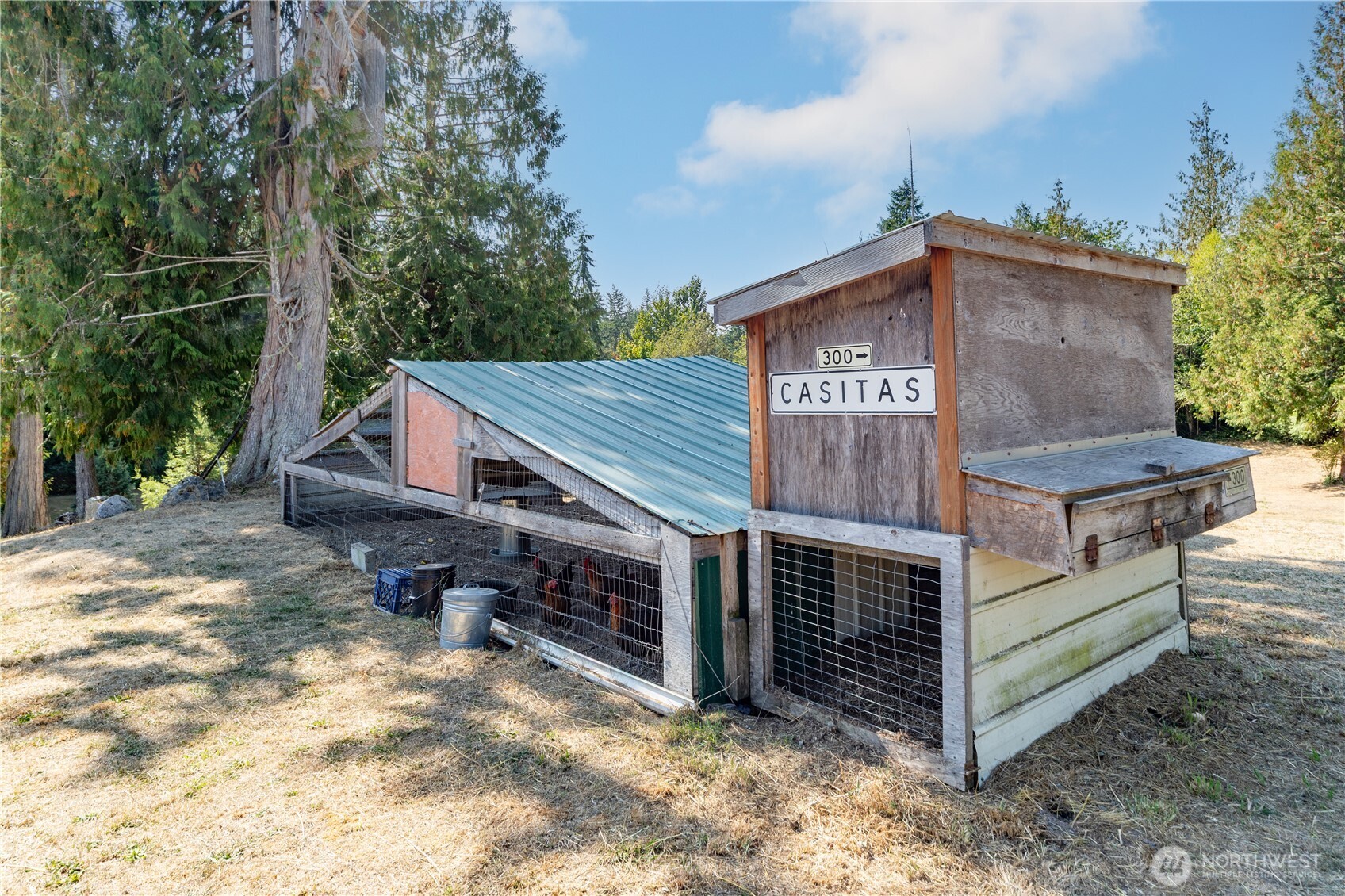 2035 Egg And I Road Chimacum, WA 98325 - Photo 32 of 40 a view of a house with a yard and wooden fence
