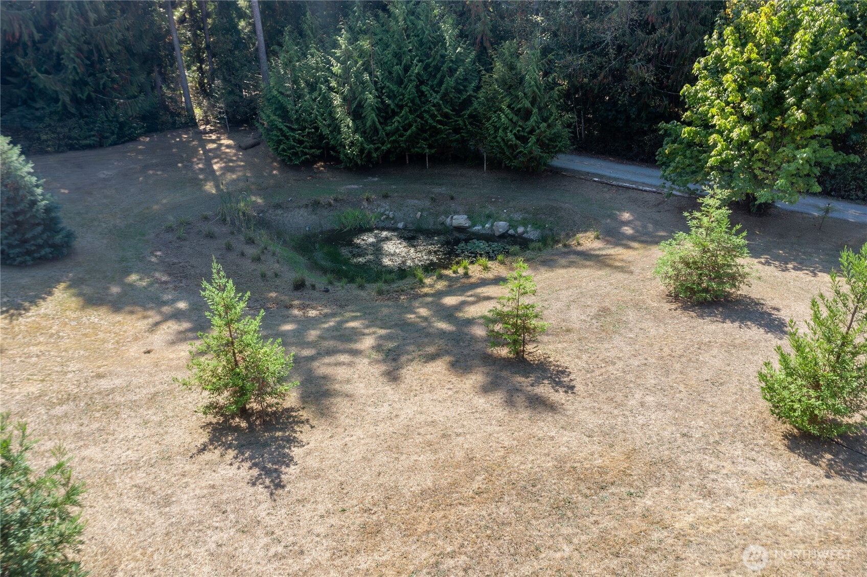2035 Egg And I Road Chimacum, WA 98325 - Photo 34 of 40 a view of a lake with lots of green space