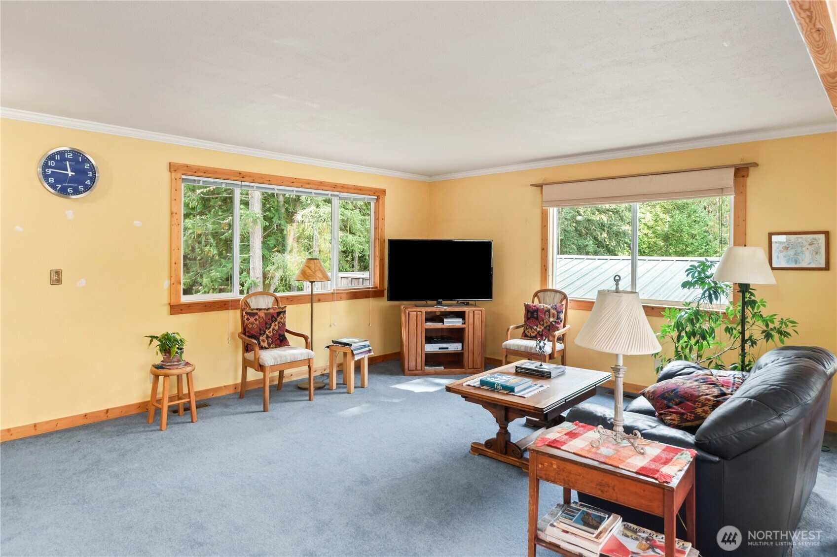 2035 Egg And I Road Chimacum, WA 98325 - Photo 4 of 40 a living room with furniture and a flat screen tv