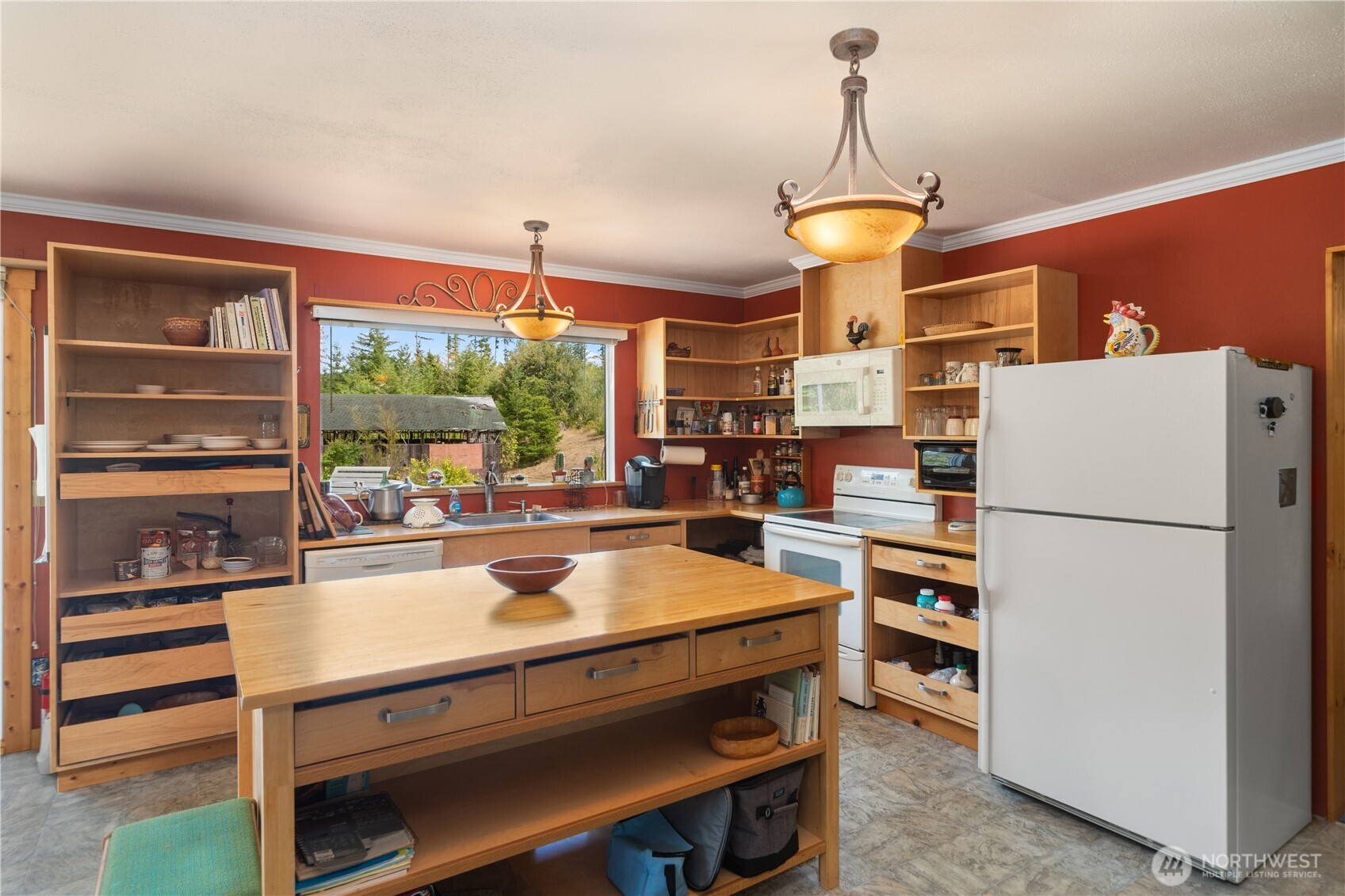 2035 Egg And I Road Chimacum, WA 98325 - Photo 6 of 40 a room with furniture a chandelier and a dining table
