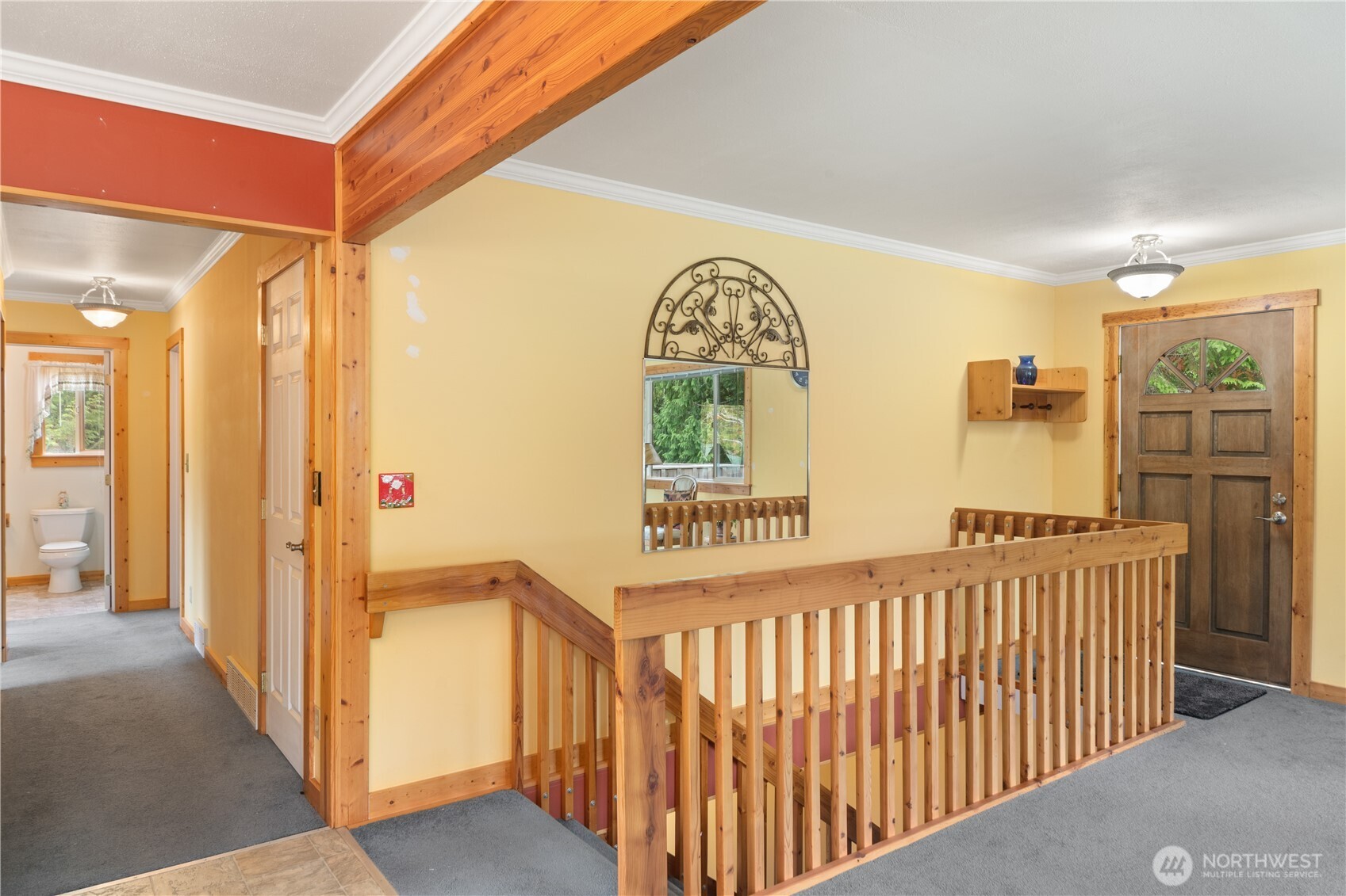 2035 Egg And I Road Chimacum, WA 98325 - Photo 9 of 40 a view of a hallway to a livingroom with furniture