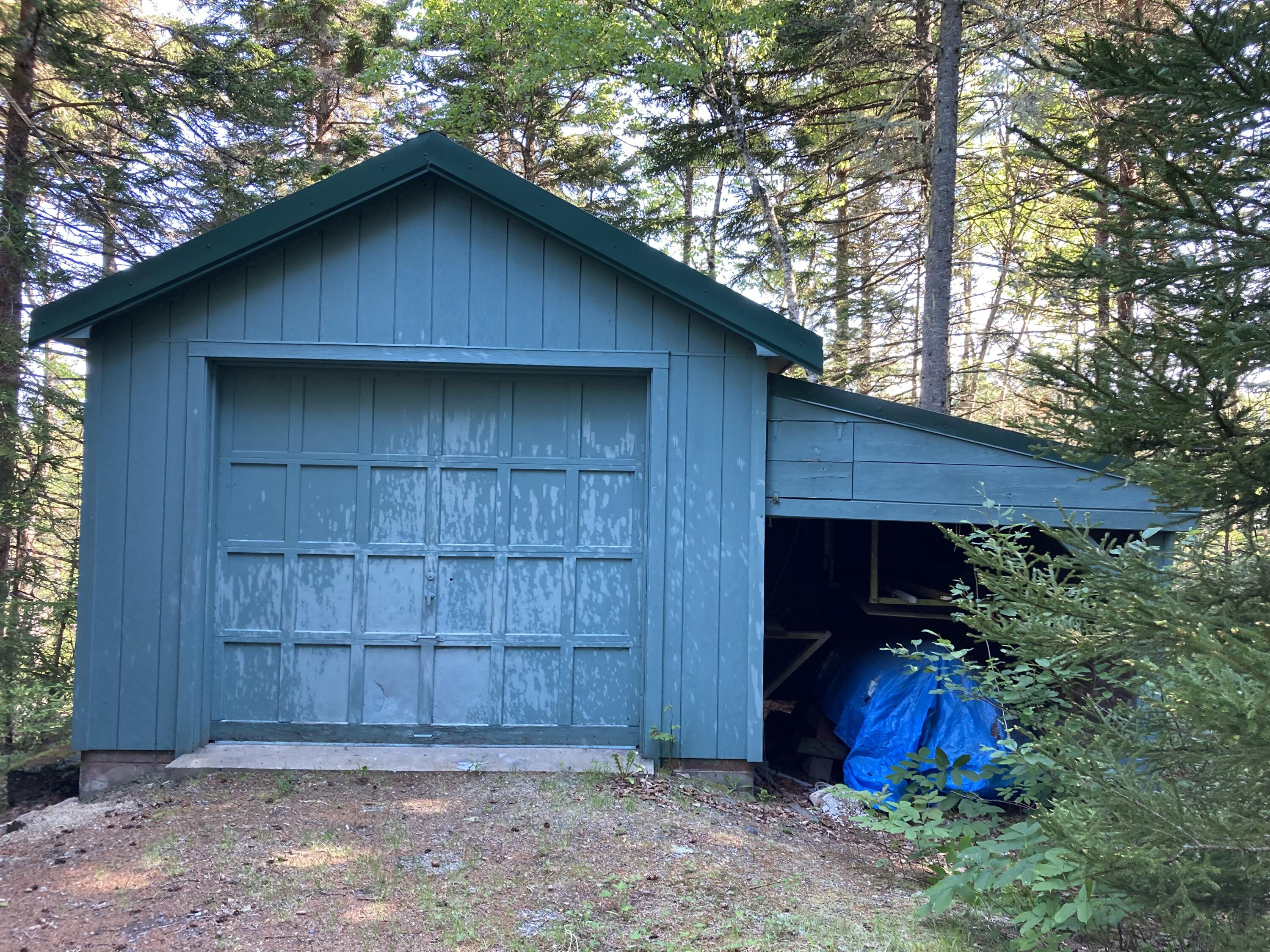 145 Summer Harbor Road Gouldsboro, ME 04607 - Photo 15 of 36 Garage with boat storage space beside.