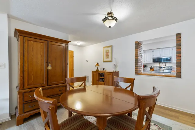 a view of a dining room with furniture