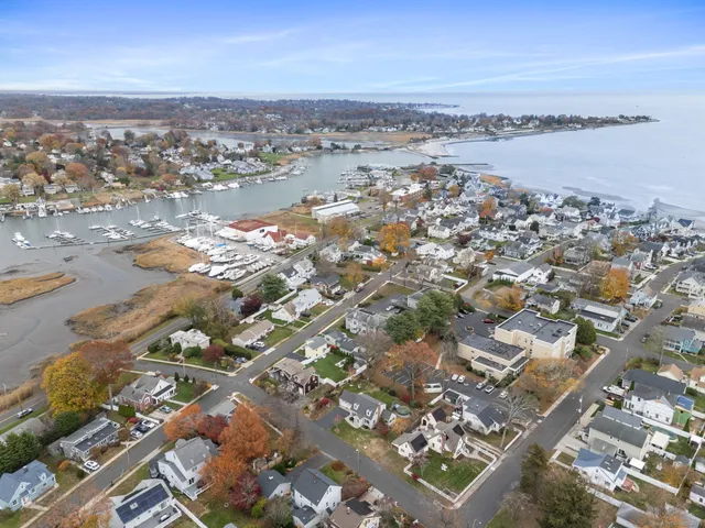 an aerial view of a city with lots of residential buildings