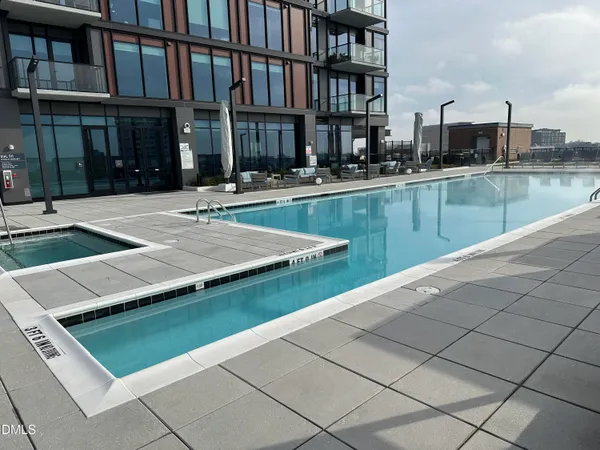 a view of a building with a swimming pool