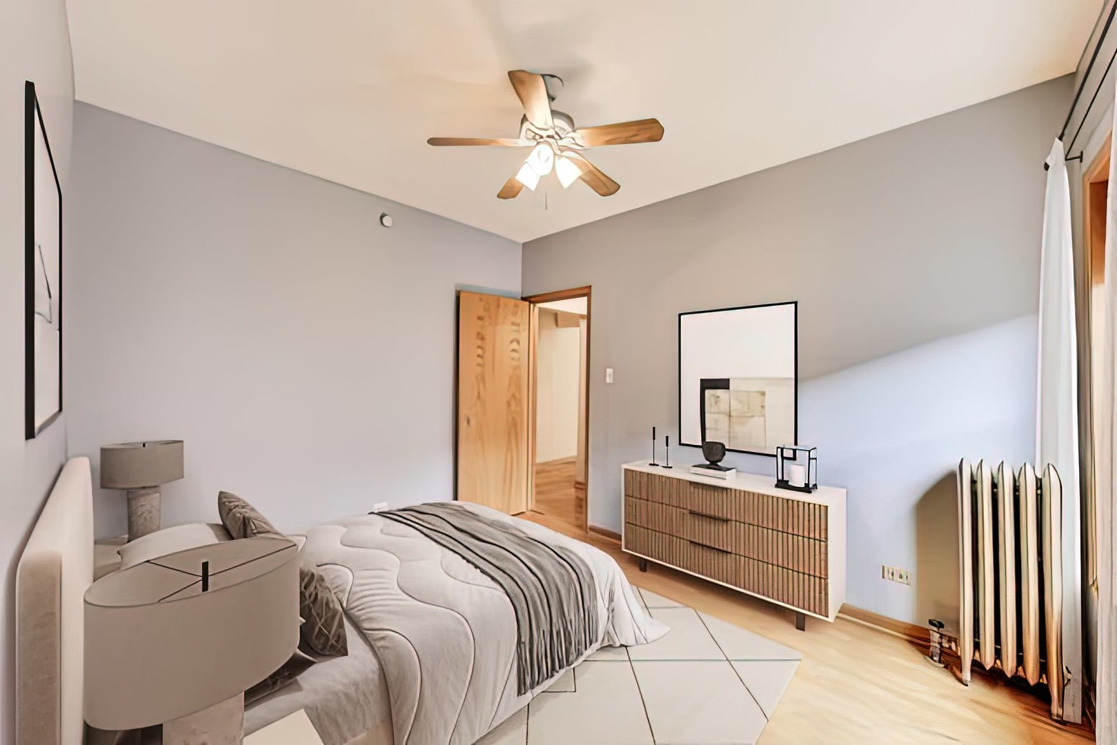 243 Washington Boulevard, Unit 3A Oak Park, IL 60302 - Photo 11 of 29 a bedroom with a bed and a chandelier