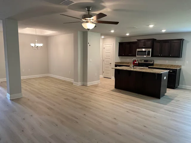 a view of hallway with washer and dryer