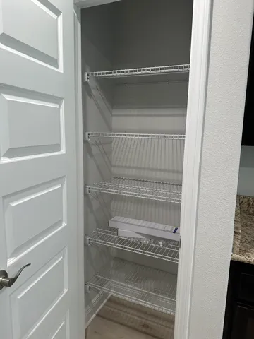 a bathroom with a light fixture and a sink