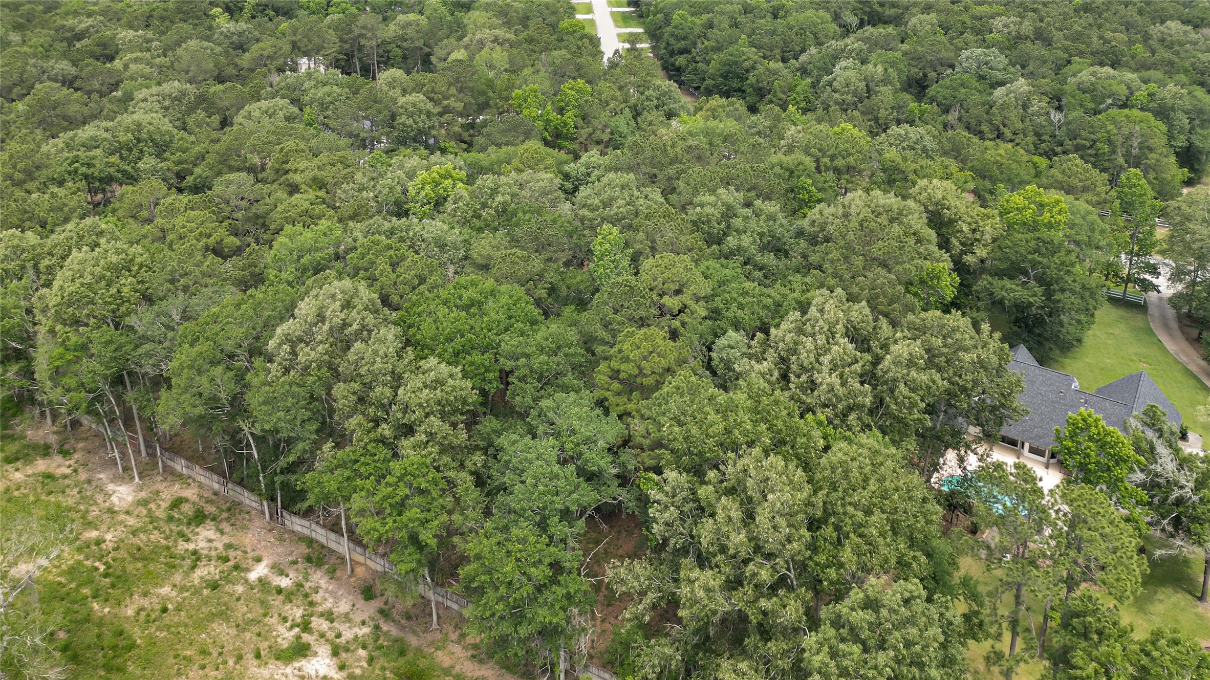 1030 South Commons View Drive Houston, TX 77336 - Photo 10 of 14 Back left side aerial view of the property