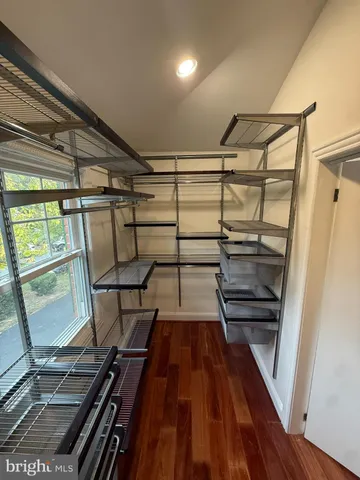 a view of an empty walk in closet