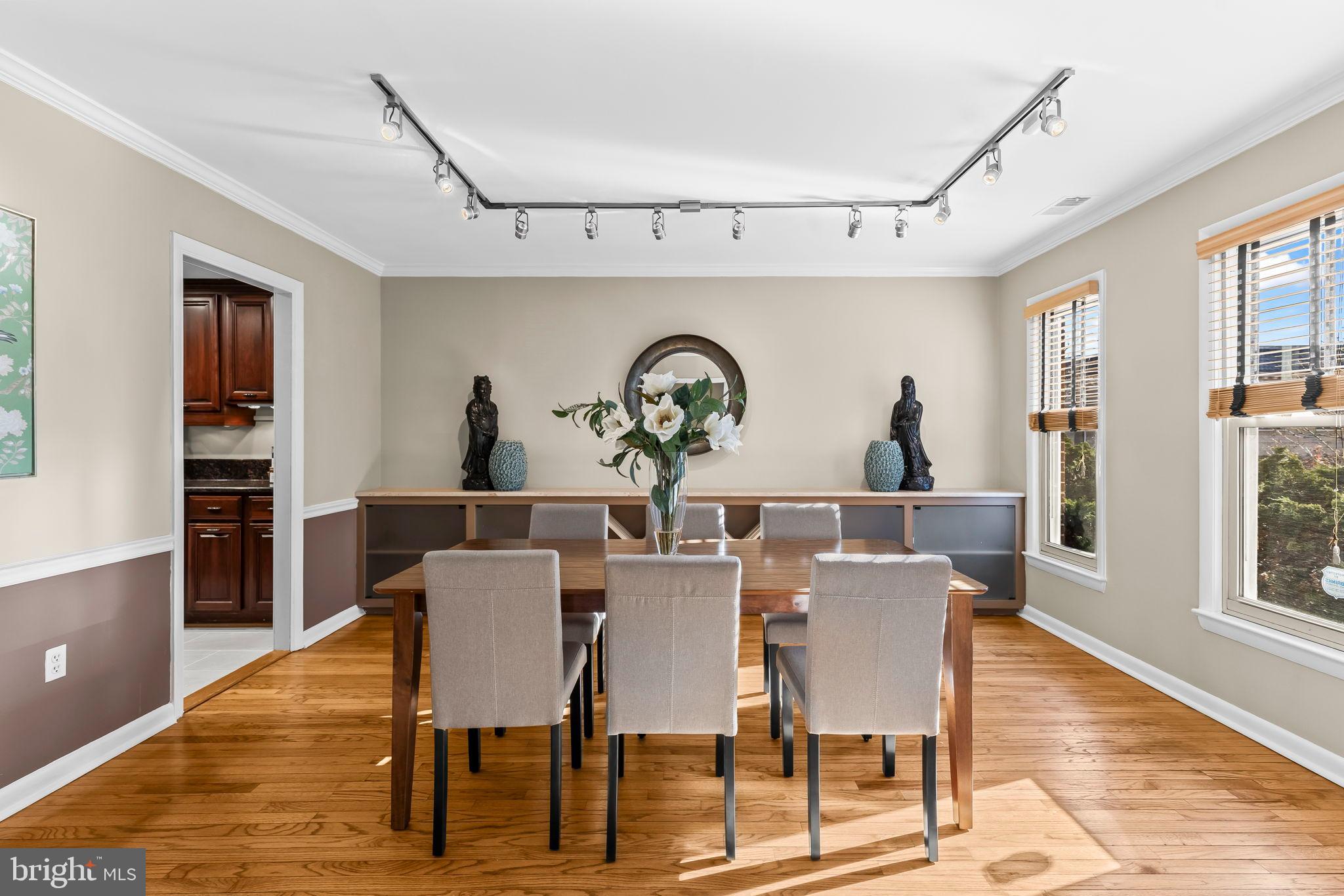 1729 Newton Street Northwest Washington, DC 20010 - Photo 4 of 45 a view of a dining room with furniture and wooden floor