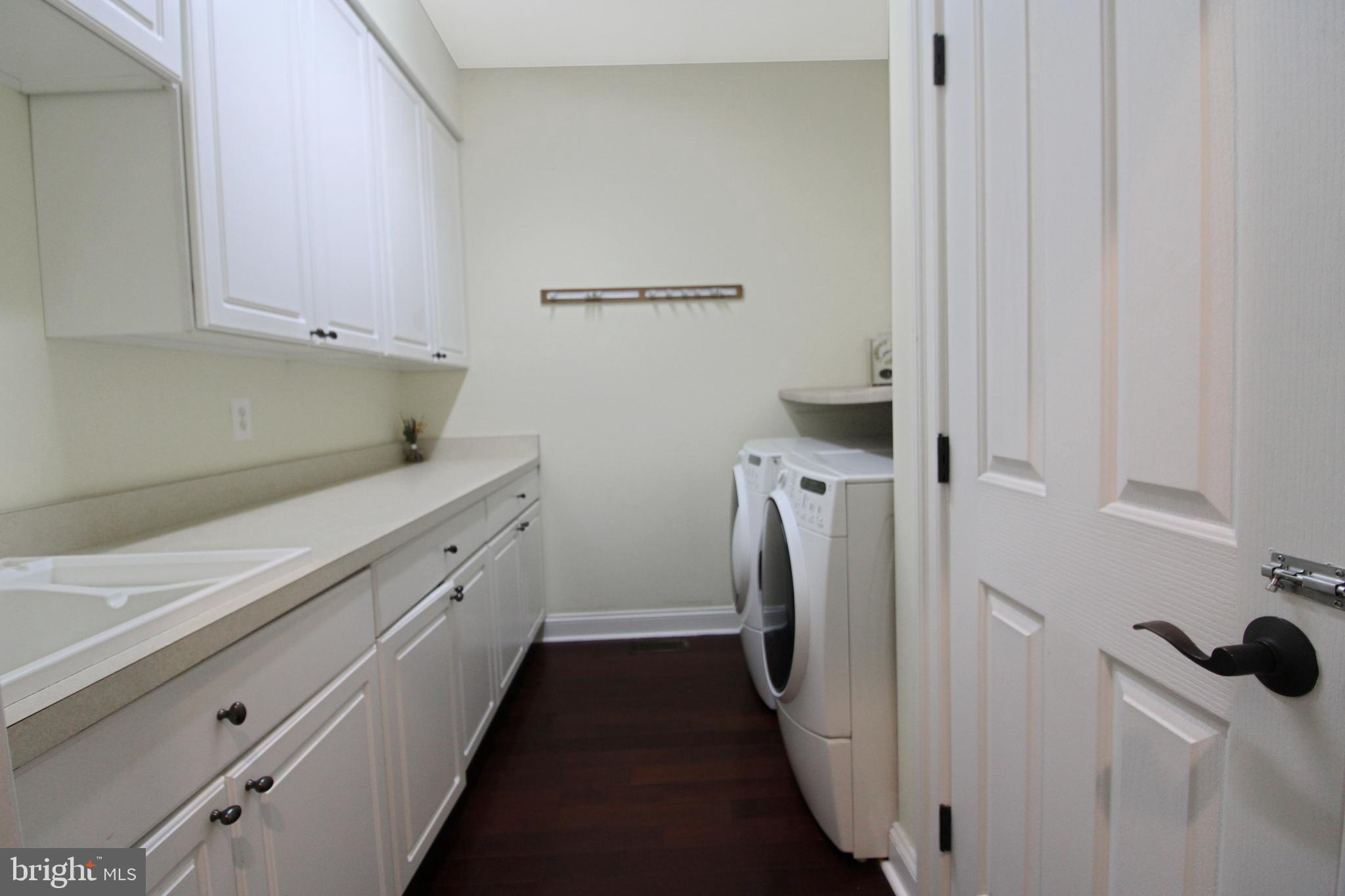 113 Paulowina Road Queen Anne, MD 21657 - Photo 16 of 42 a utility room with dryer and washer