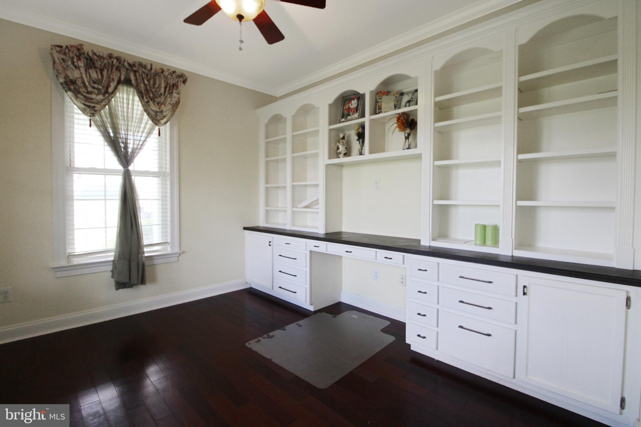 113 Paulowina Road Queen Anne, MD 21657 - Photo 18 of 42 a hallway with cabinets
