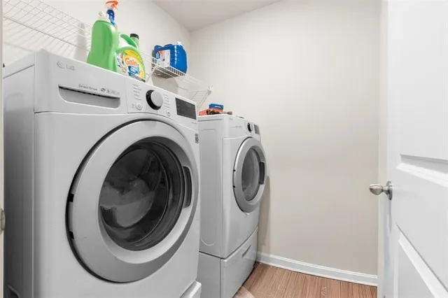a utility room with dryer and washer
