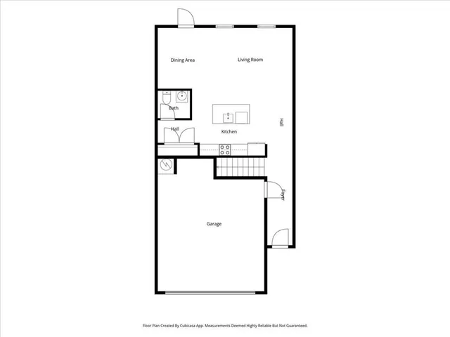 a picture of a bench in front of a wall