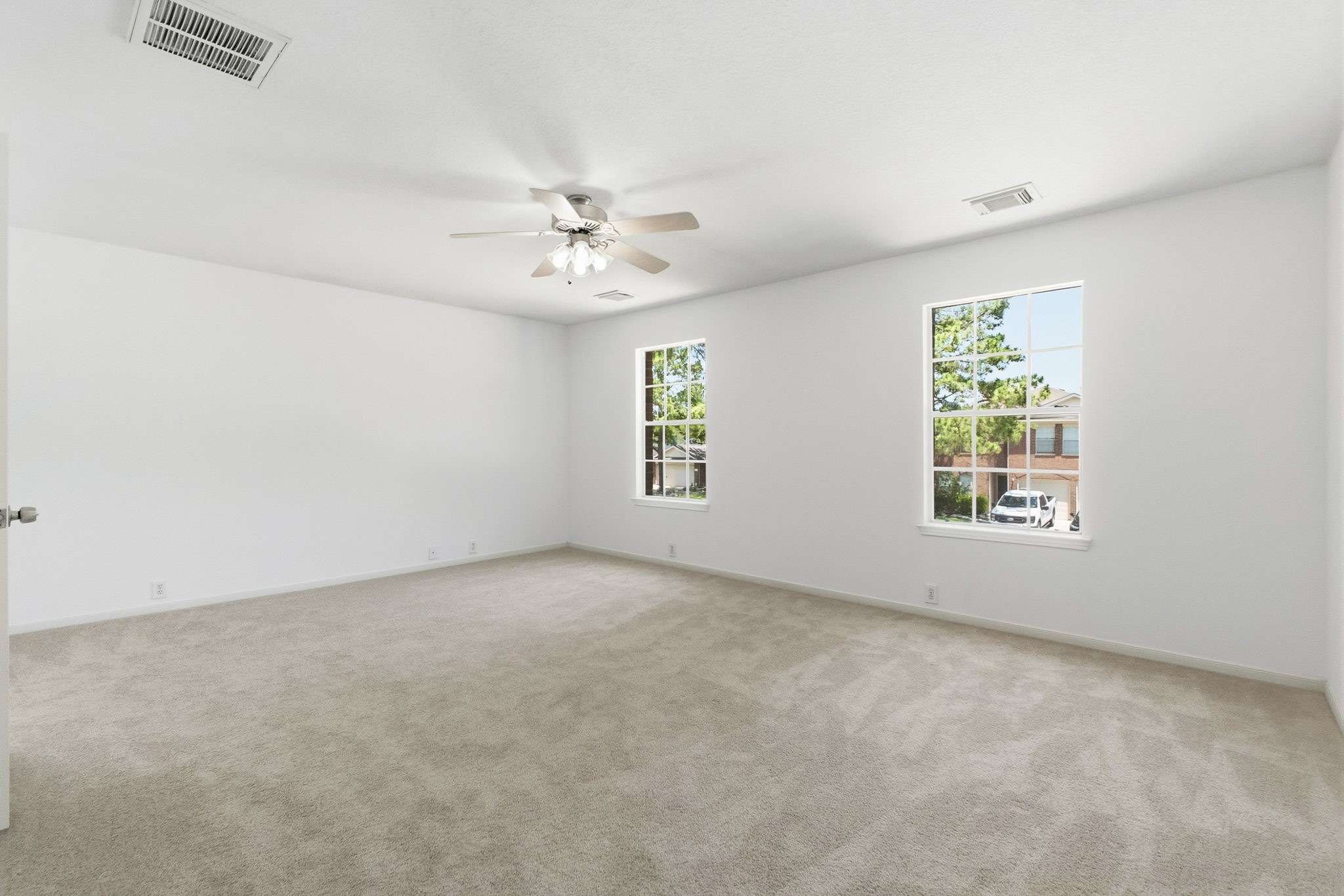11907 Ezekiel Road Tomball, TX 77375 - Photo 24 of 39 an empty room with windows