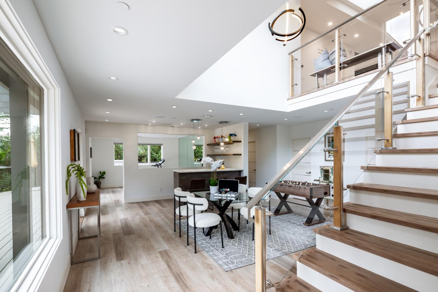 1045 Trinity Drive Menlo Park, CA 94025 - Photo 13 of 31 a living room with furniture and wooden floor