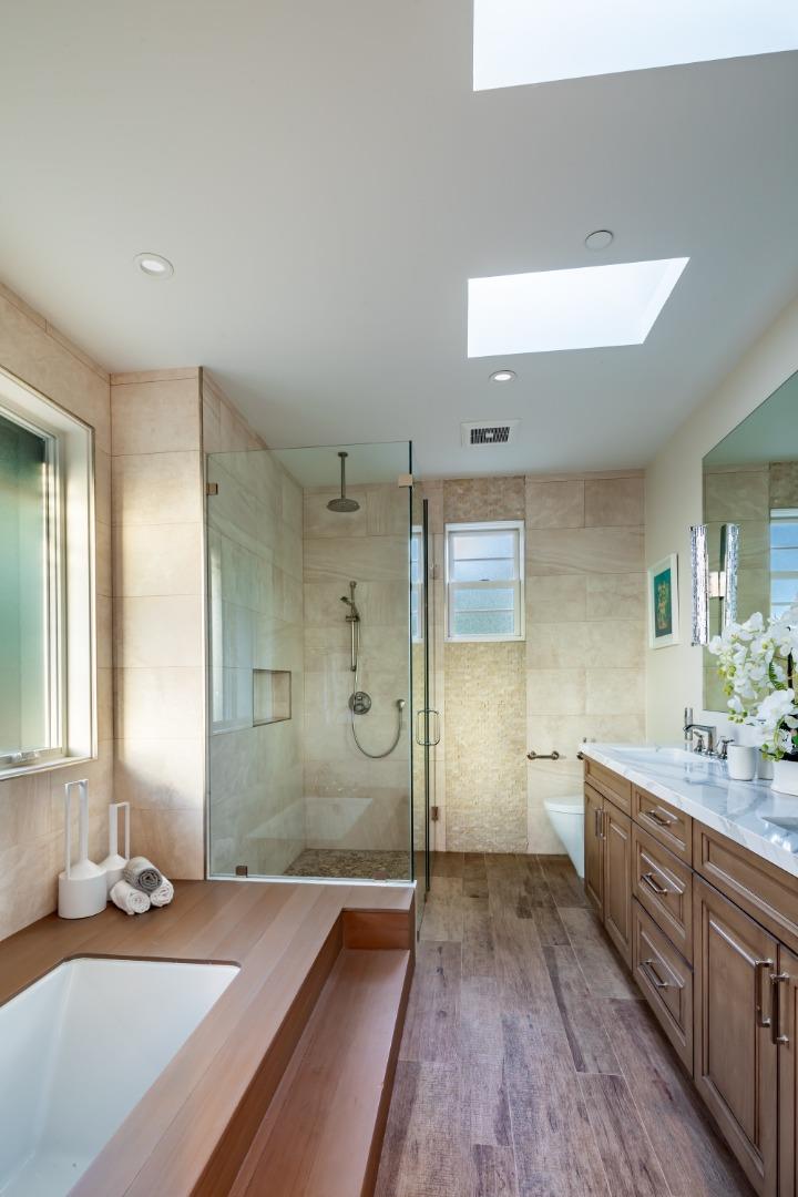 1045 Trinity Drive Menlo Park, CA 94025 - Photo 22 of 31 a bathroom with a sink a toilet and shower