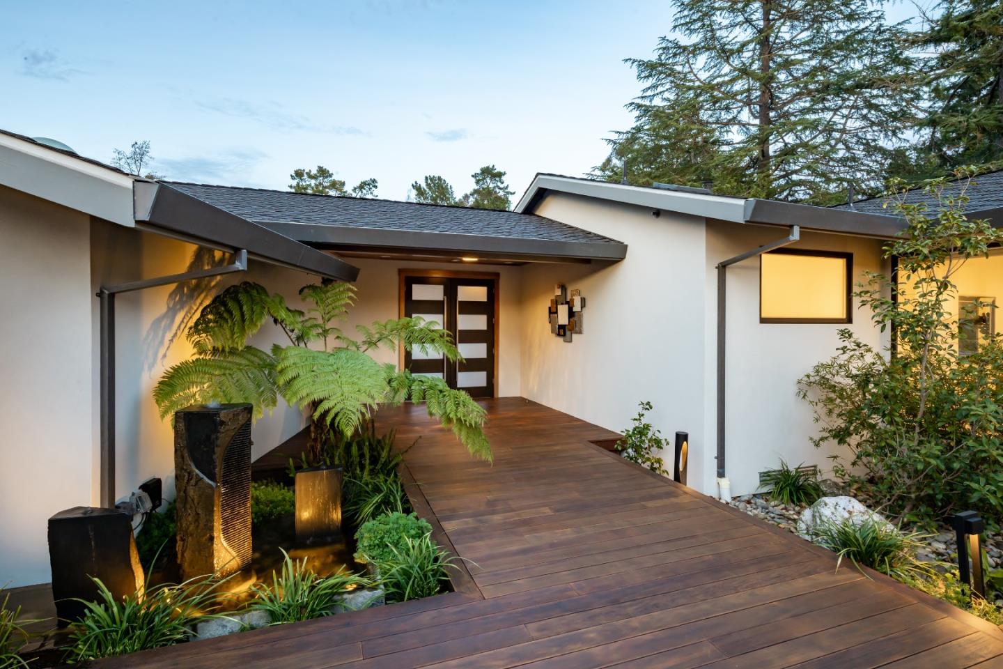 1045 Trinity Drive Menlo Park, CA 94025 - Photo 4 of 31 a front view of a house with garden