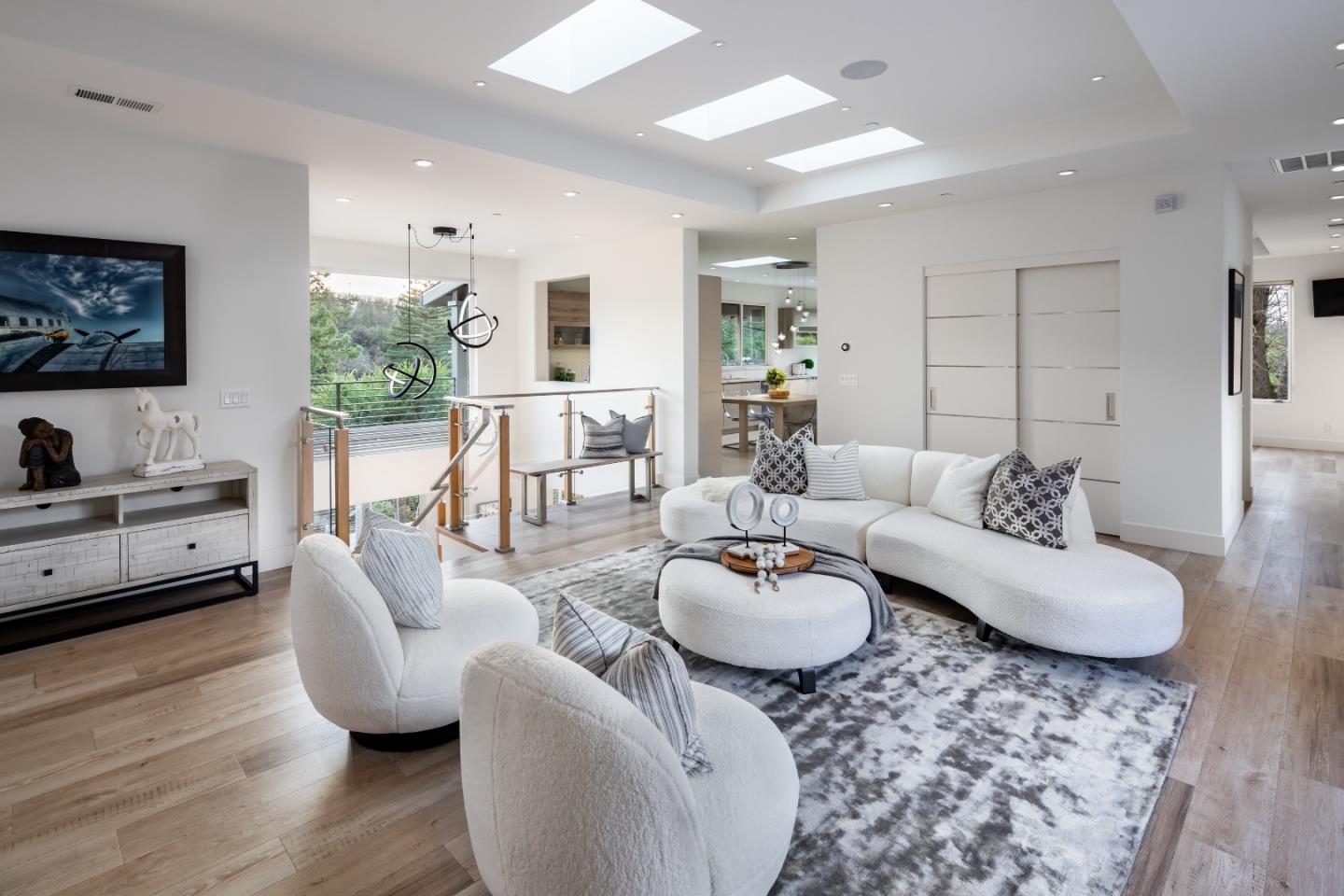 1045 Trinity Drive Menlo Park, CA 94025 - Photo 6 of 31 a living room with furniture and wooden floor