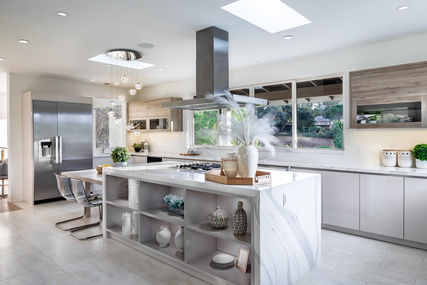 1045 Trinity Drive Menlo Park, CA 94025 - Photo 9 of 31 a kitchen with stainless steel appliances granite countertop a sink and cabinets