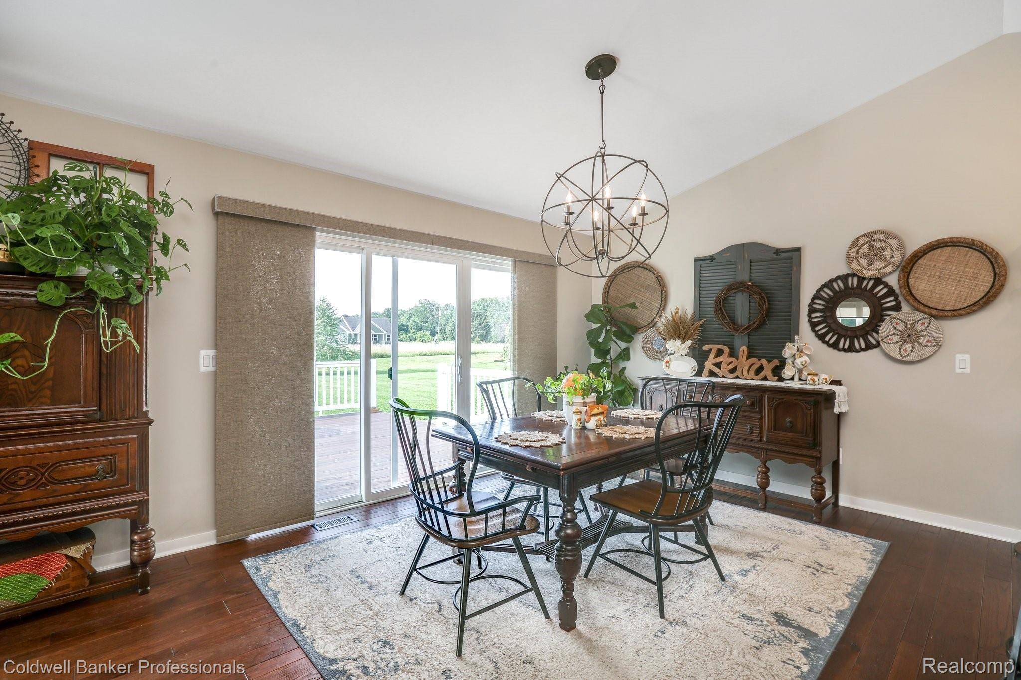 8665 Oakhill Road Clarkston, MI 48348 - Photo 11 of 49 Dining area with sliding door to the rear, Trex deck