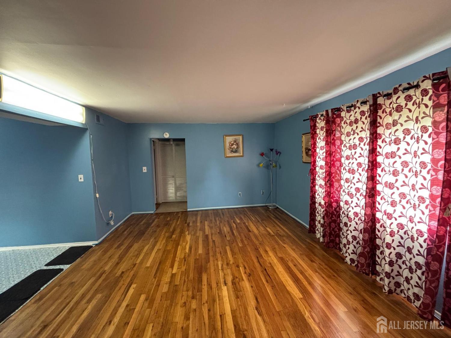 30 Judson Street, Unit 8A Edison, NJ 08837 - Photo 4 of 7 a view of wooden floor in a room