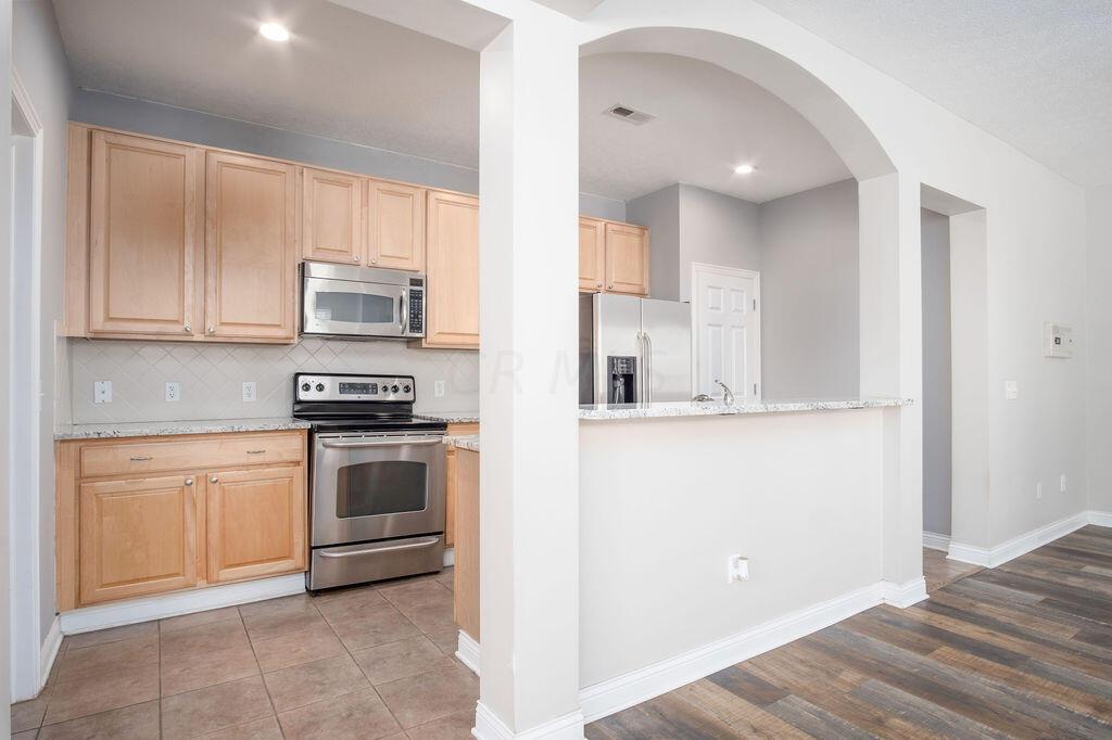 6051 Hayden Farms Road Dublin, OH 43016 - Photo 7 of 34 Open Kitchen