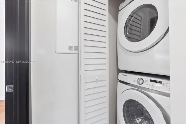 a utility room with dryer and washer