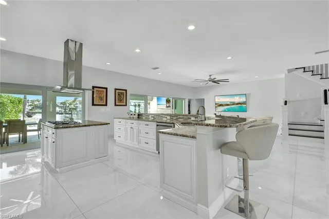 a kitchen with counter top space and appliances