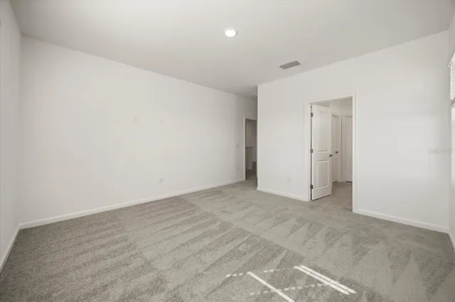 a bathroom with a sink a vanity and a mirror