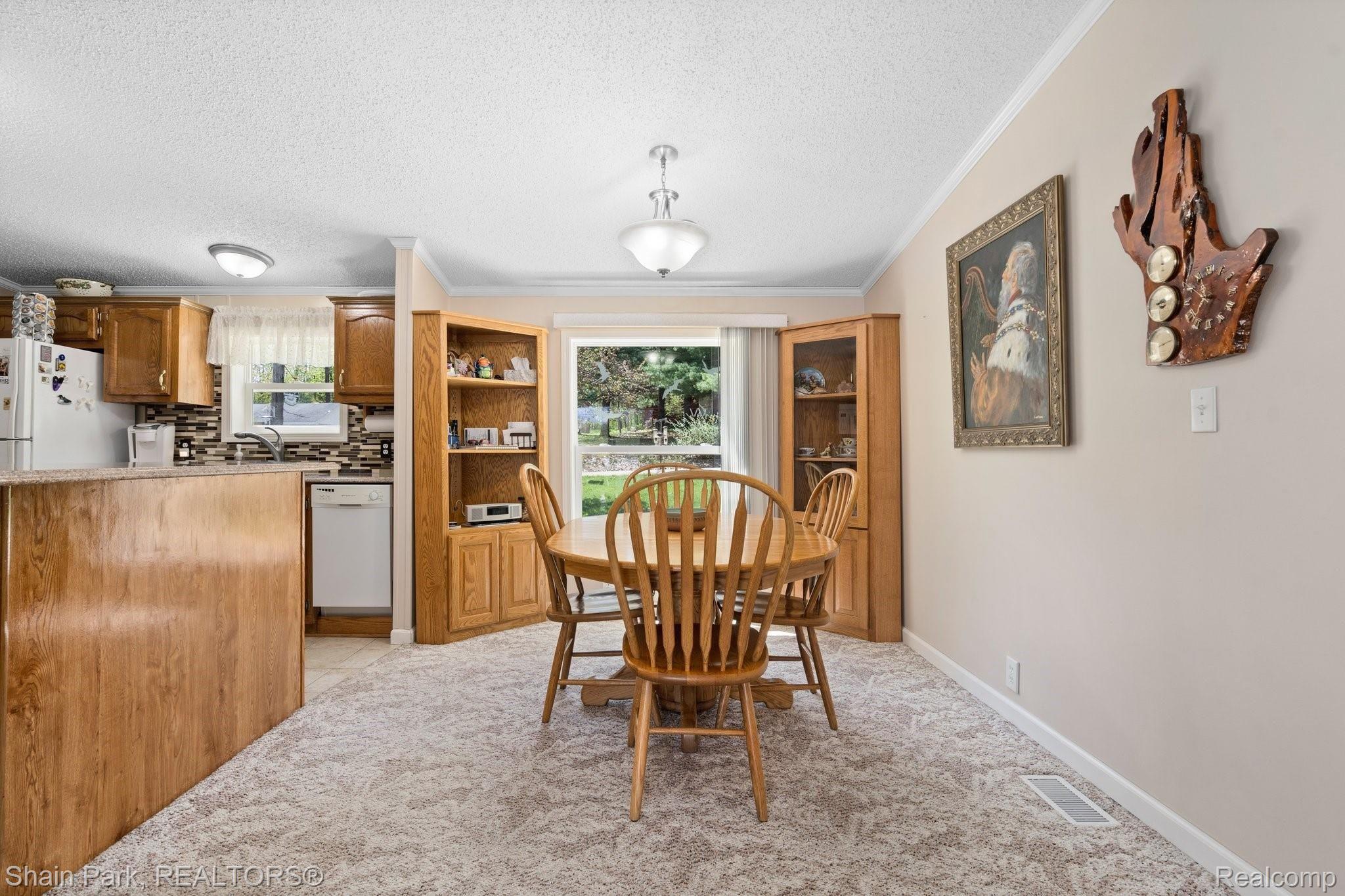 301 Shappell Road Harrison, MI 48625 - Photo 12 of 53 Dining Room with Built-Ins