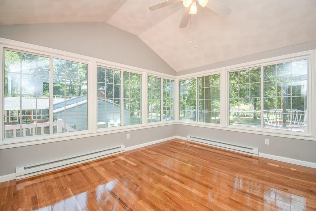 131 New Estate Road Littleton, MA 01460 - Photo 8 of 16 a view of empty room with wooden floor and fan