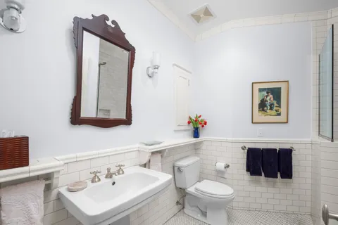 a utility room with a sink dryer and washer