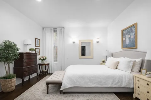 a bath room with a bathtub and a shower