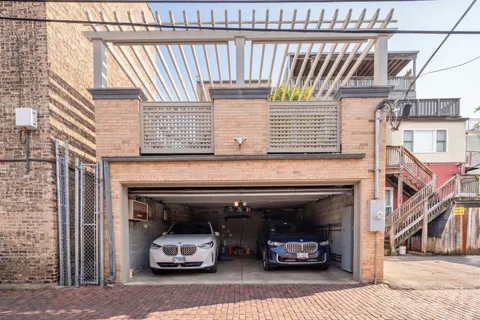 a picture of a room with a white wall and a large window