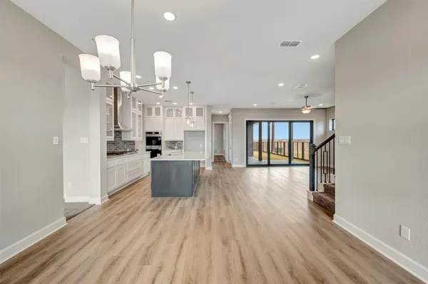 a bathroom with a sink a toilet and a bathtub