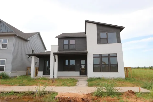 a picture of a park with furniture and a window