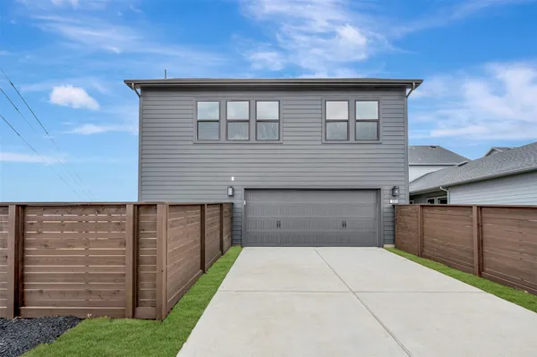 a view of a house with a garage