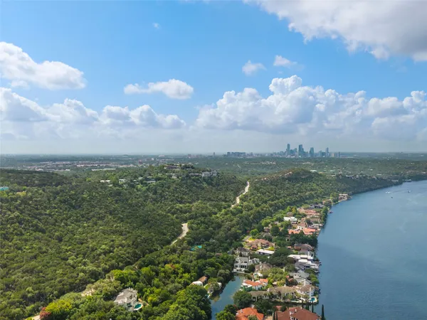 a view of a lake with a city