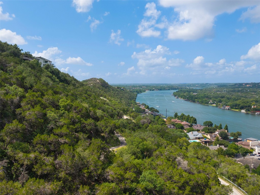 4323 Mt Bonnell Road Austin, TX 78731 - Photo 15 of 24 a view of a lake with a city