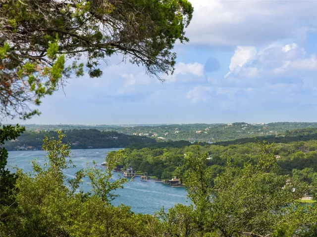a view of lake with mountain in background