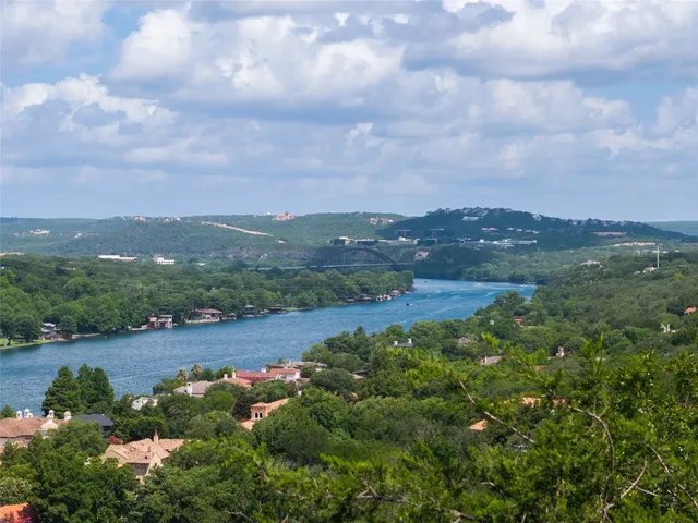 a view of a lake with mountains in the background