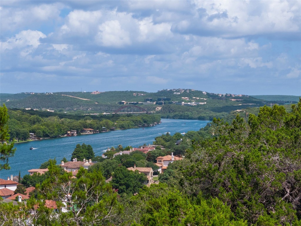 4323 Mt Bonnell Road Austin, TX 78731 - Photo 20 of 24 a view of a lake with mountains in the background
