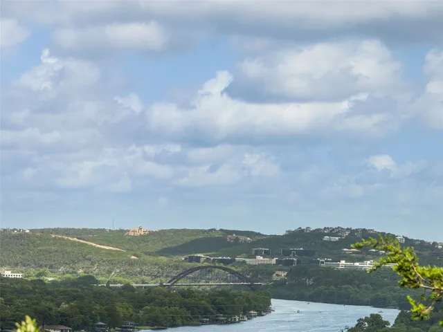 a view of a lake with a big yard