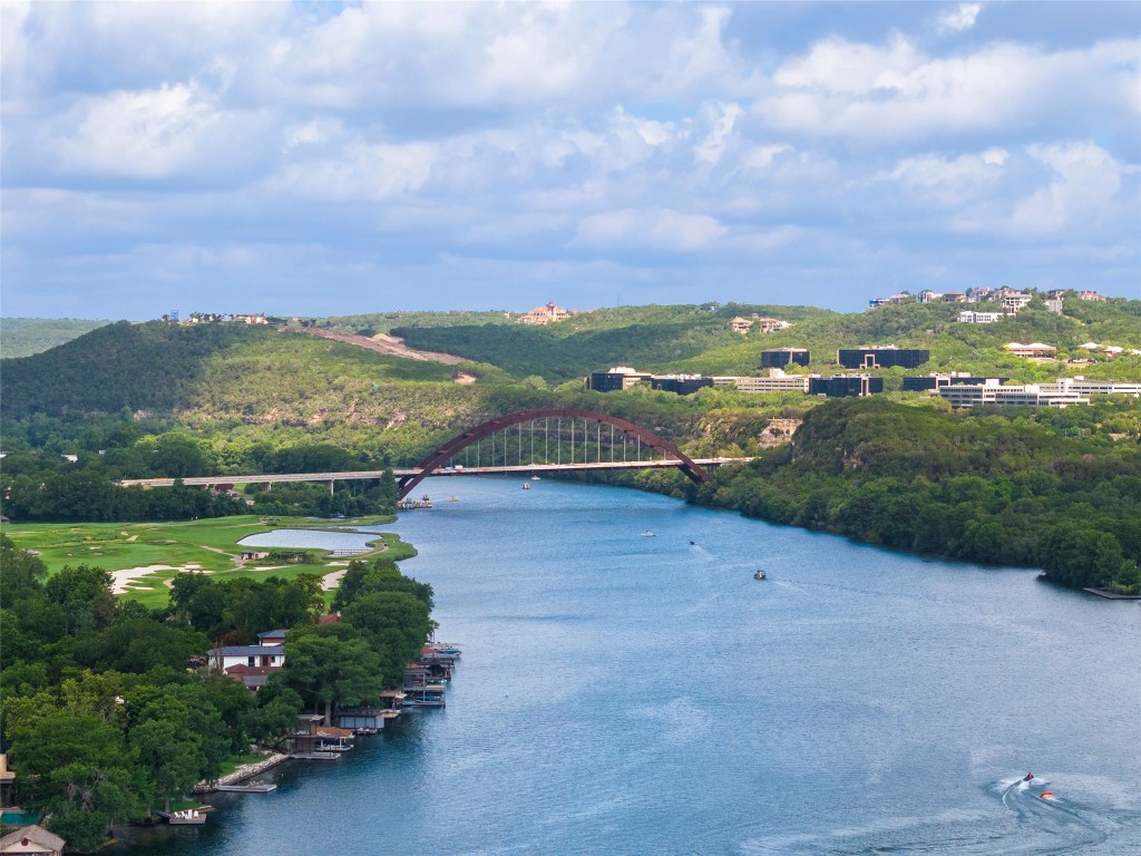 4323 Mt Bonnell Road Austin, TX 78731 - Photo 23 of 24 a view of a lake with a city