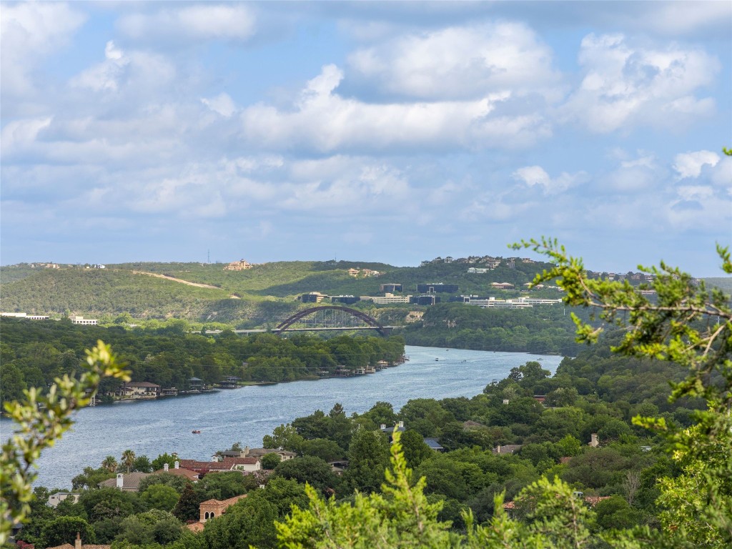 4323 Mt Bonnell Road Austin, TX 78731 - Photo 24 of 24 a view of a lake with mountains in the background