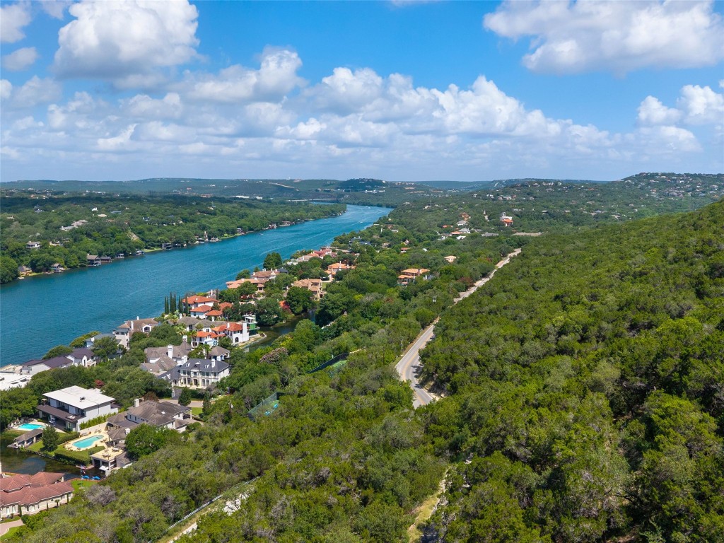 4323 Mt Bonnell Road Austin, TX 78731 - Photo 7 of 24 a view of a lake with a city